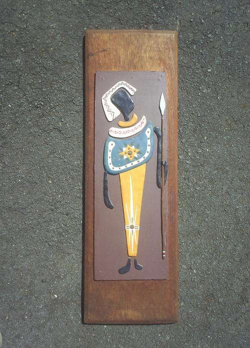 African motive on hard wood base