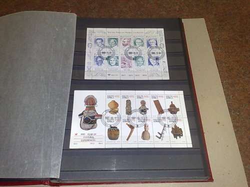 GOOD LIGHTHOUSE 16 PGE STOCKBOOK,HALF FILLED WITH RSA,MINISHEETS ETC,CTO LOT