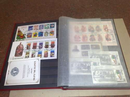 GOOD LIGHTHOUSE 16 PGE STOCKBOOK,HALF FILLED WITH RSA,MINISHEETS ETC,CTO LOT