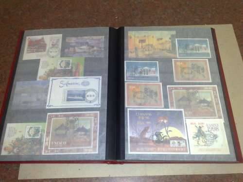 GOOD LIGHTHOUSE 16 PGE STOCKBOOK,HALF FILLED WITH RSA,MINISHEETS ETC,CTO LOT