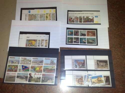 GENUINE GLORY LOT TO CLEAR-STOCK CARDS WITH STAMPS.PAGES,PACKETS-MOSTLY GOOD CONDITION,SEE PHOTOS