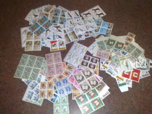 RHODESIA-CLEARANCE LOT-100 BLOCKS OF 4,PLUS APP 200 PLUS UM,SINGLES,PAIRS ETC-GOOD VALUE
