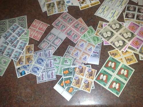 RHODESIA-CLEARANCE LOT-100 BLOCKS OF 4,PLUS APP 200 PLUS UM,SINGLES,PAIRS ETC-GOOD VALUE
