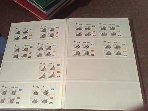 LARGE COLLECTION TO CLEAR-8 STOCKBOOKS PLUS 4 FDC ALBUMS-SOME RUST INTRUSION AND SOILING-