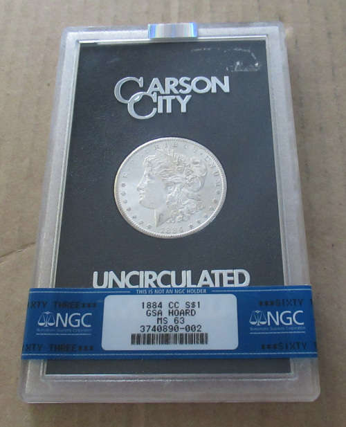 Rare 1884 CC Morgan Silver Dollar MS63 NGC GSA Hoard in original Holder