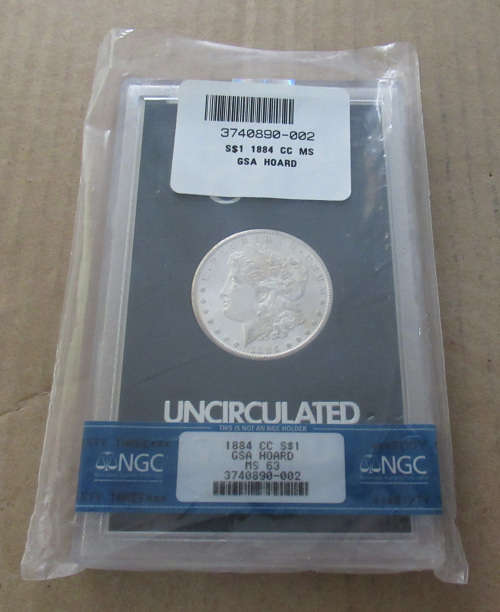 Rare 1884 CC Morgan Silver Dollar MS63 NGC GSA Hoard in original Holder