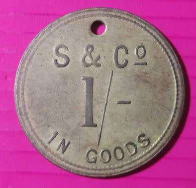 *** STRACHAN AND CO 1 SHILLING TOKEN - AS PER IMAGES ***