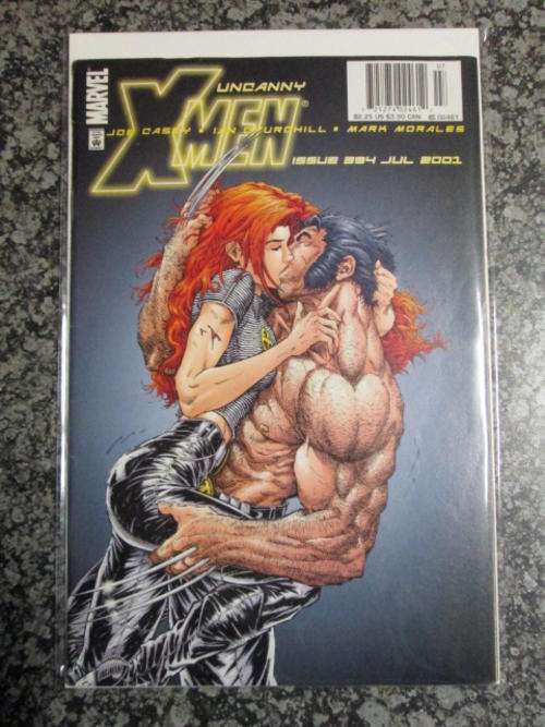 Uncanny X-Men #394 (FN 6.0 - 1990) Kiss Cover