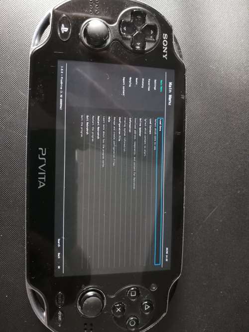 PS VITA WITH OVER 1000 GAMES SEE DESCRIPTION