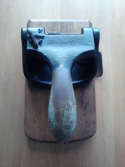 Vintage Punch Mounted In Solid Wood