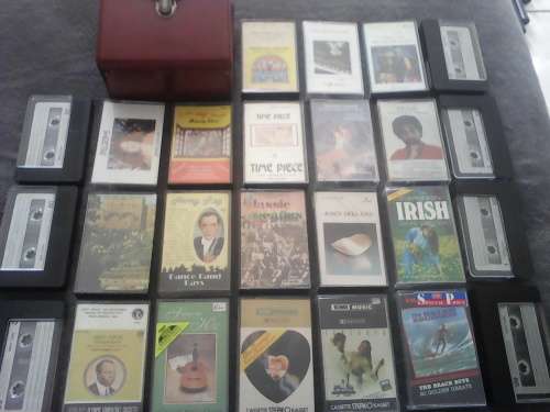 25 x Assorted Tapes + Small Carry Case (Sold as one Lot)