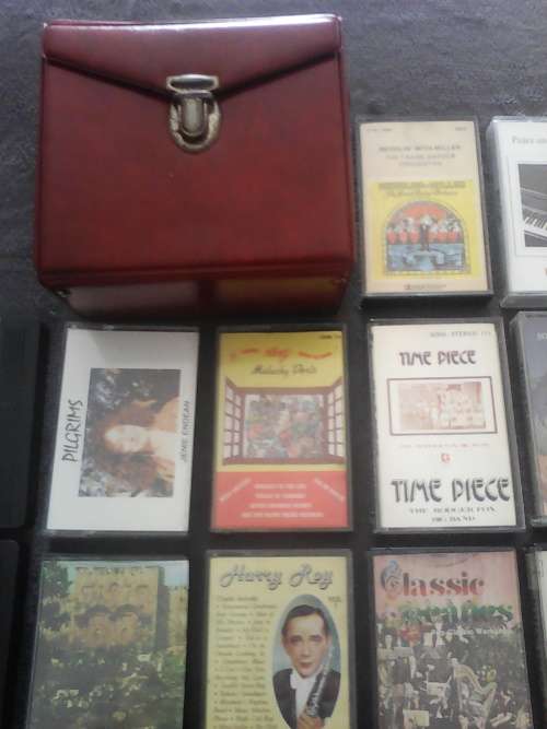 25 x Assorted Tapes + Small Carry Case (Sold as one Lot)