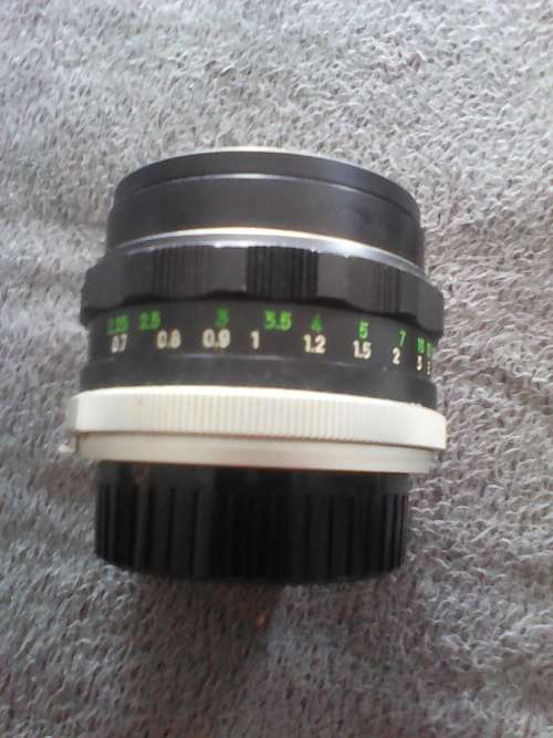 Minolta 1:1.7 f=55mm Lens