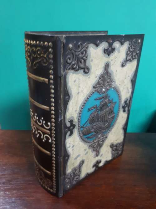 Vintage Book Shaped Tin With Man of War Theme