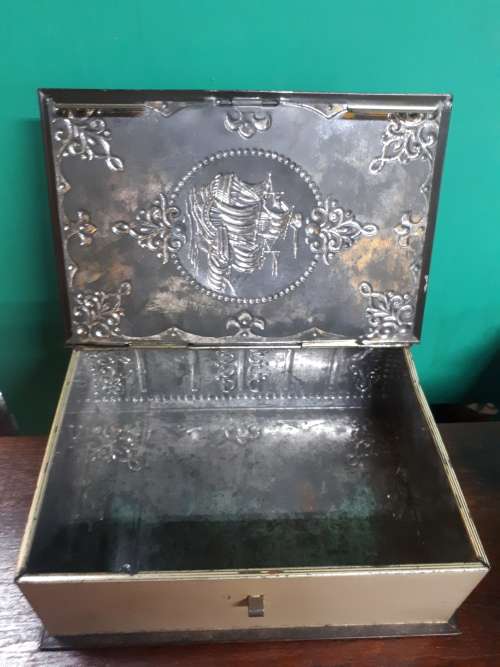 Vintage Book Shaped Tin With Man of War Theme
