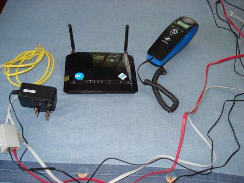 D-link DSL-2750U ADSL2+ Modem, Wireless Router and 4port 10/100 and Apolo s121 desktop phone!