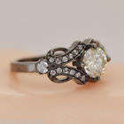 0.90ct centre - H-J -VVS1 - [6.6 X 4.3mm]  Moissanite - Set Black Rhodium Ring