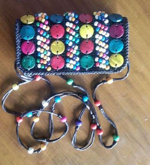 Gorgeous Beadwork womena  purse with sling beadwork band....beautiful colours