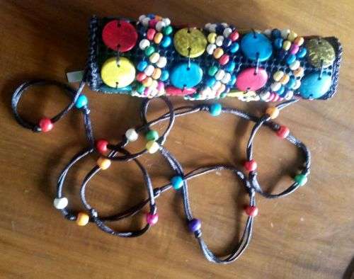 Gorgeous Beadwork womena  purse with sling beadwork band....beautiful colours