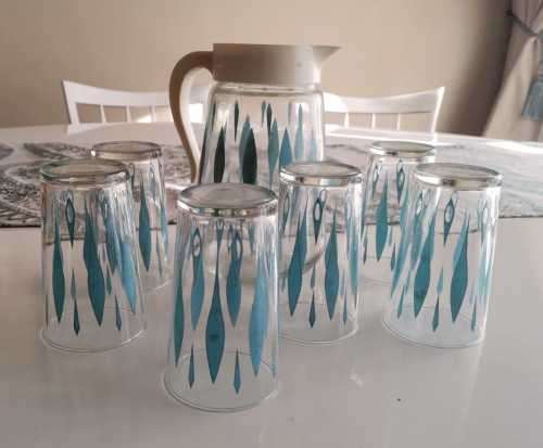 Water Jug with 6 castor tumblers...Pristine Condition in original box