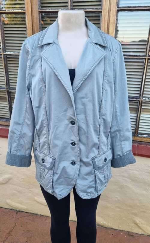 Gorgeous Grey jacket with lace detailing on seeve