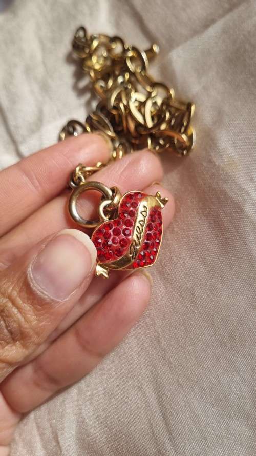 GUESS heart chain....HARDLY WORN...shipping From R30