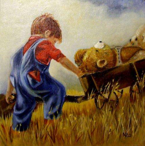 Little Boy Playing with his teddy