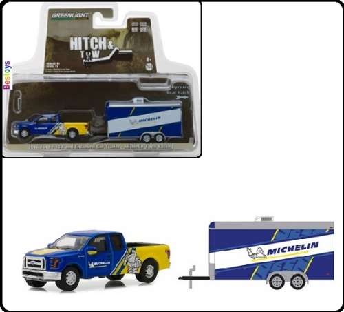 Greenlight Diecast Model Car Set Hitch and Tow Ford F 150 F150 Pickup 2016 + Car Trailer `Michelin`