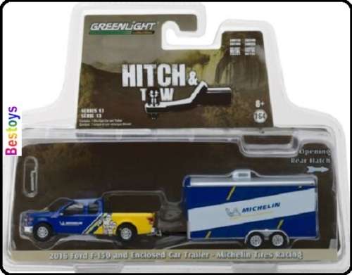 Greenlight Diecast Model Car Set Hitch and Tow Ford F 150 F150 Pickup 2016 + Car Trailer `Michelin`