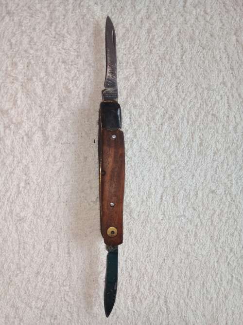 Vintage folding knife. Victorinox. wooden handle, Maybe restored by someone?