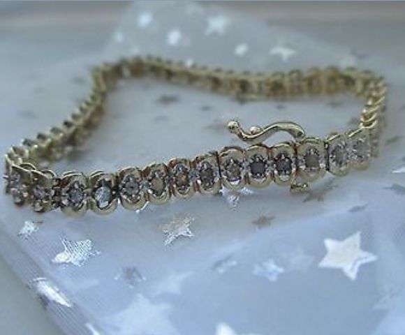 10k gold and diamond bracelet aprx 2 carats