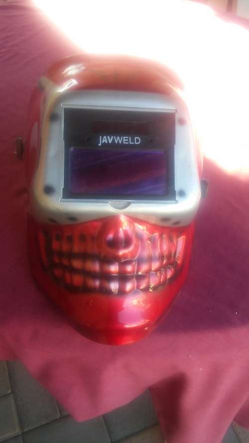 Auto darkening adjustable welding helmet