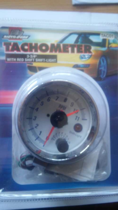 Tachometer with red shift light