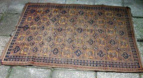 Hand knotted large rug with loads of character 1.67m x 1.18m- Fantastic Buy!