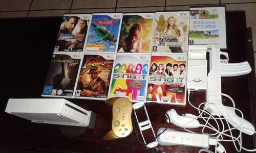 WII CONSOLE,REMOTE, NUNCHUCK,GUN,GOLDEN REMOTE, DOCKING STATION WITH A BATERY CHARGER AND 9 GAMES