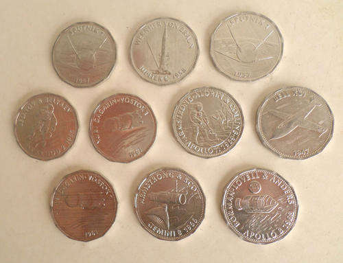 SET OF 10 SHELL MAN IN FLIGHT TOKENS (COLLECTIBLE SERIES-OIL-PETRONALIA-BP-MOBIL-TIN-CAN-BOTTLE)