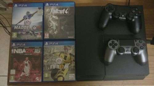 Pre-owned 500GB PS 4 with 2 controllers and 4 games.