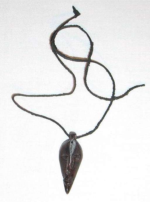 **STUNNING**STONE CARVED FACE PENDANT