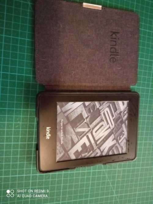 Kindle Paperwhite Touch with Backlight - Including books of your choice