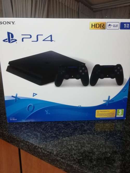 Playstation 4 1TB slim ++ extra controller**BRAND NEW**