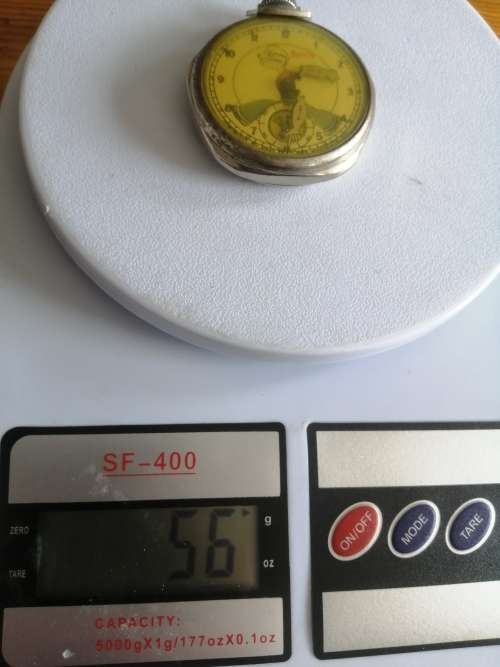 Vintage New Haven Popeye Character dollar pocket watch 1935, working but needs a service