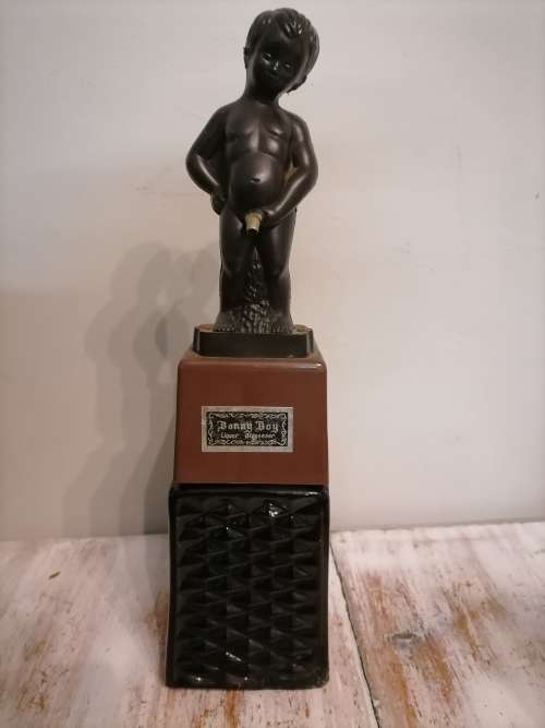 Vintage Piano Metronome and vintage liquor dispenser