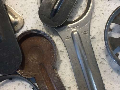 Vintage watch case openers
