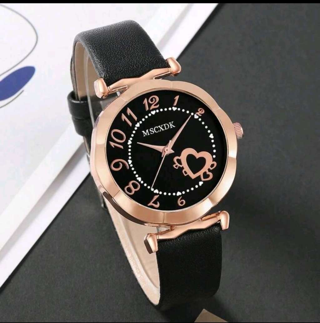 Luxurious woman 2pc watch set. With (P) leather wallet