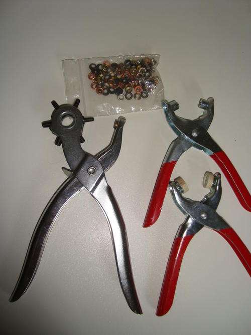 SET OF LEATHER TOOLS-revolving punch, eyelet and rivets plier and a snap button clamp plus rivets