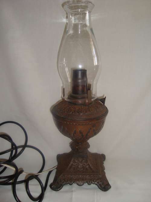 antique CAST IRON AND BRONZE oil lamp (converted into electric)- beautiful piece this...