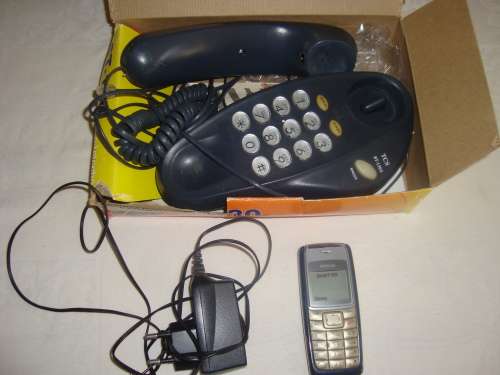 old NOKIA and a TELKOM PHONE which is still in box