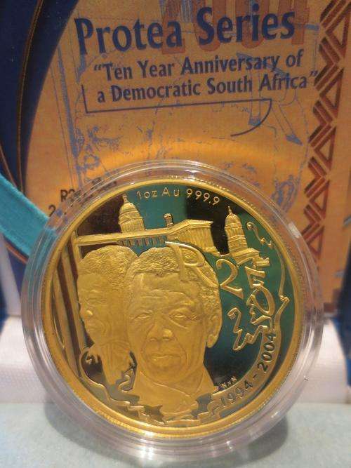 2004  PROTEA   1 oz   GOLD    MANDELA   10  year  DEMOCRACY   COIN  issued  by  S  A  MINT