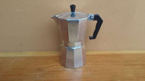 Old, medium coffee percolator.