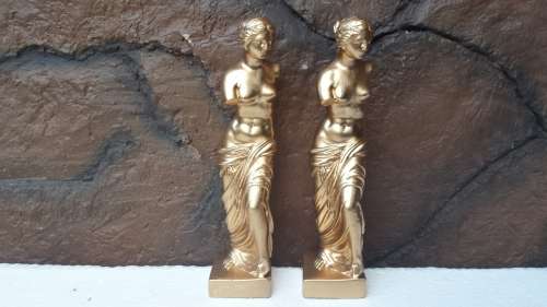Beautiful pair of armless woman statues.